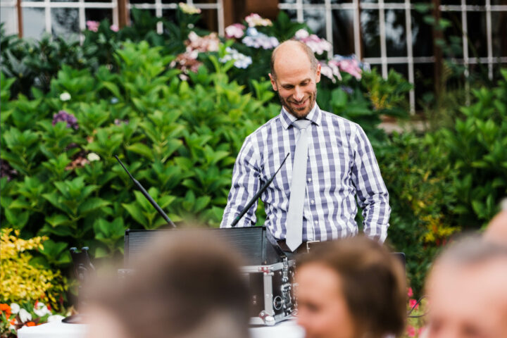 Music masters DJs a wedding at Kiana Lodge in Poulsbo